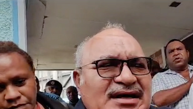 PNG former prime minister Peter O'Neill outside Boroko Police Station