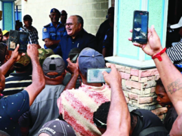 PNG former prime minister Peter O'Neill speaks to media