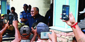 PNG former prime minister Peter O'Neill speaks to media