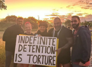 About 50 people held a protest at Brisbane's immigration detention centre