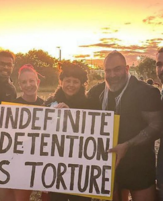 About 50 people held a protest at Brisbane's immigration detention centre