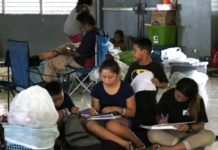 Young Guam students do school work