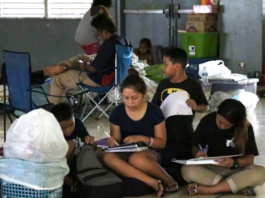 Young Guam students do school work