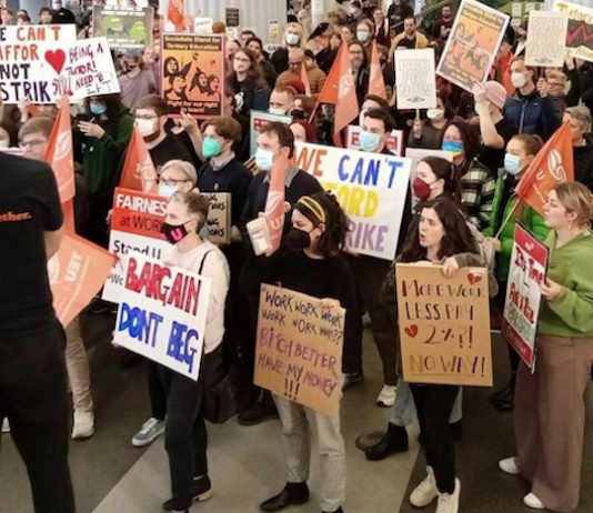 Striking Victoria University of Wellington staff and supporters protest over wages and conditions last October