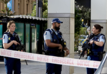 Armed New Zealand police on alert in downtown Auckland today