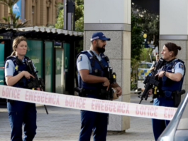 Armed New Zealand police on alert in downtown Auckland today