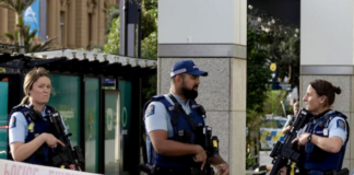 Armed New Zealand police on alert in downtown Auckland today