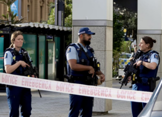 Armed New Zealand police on alert in downtown Auckland today