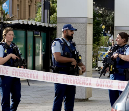 Armed New Zealand police on alert in downtown Auckland today