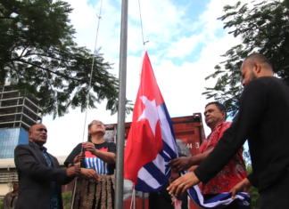 ULMWP president Benny Wenda (left) at a prayer vigil and flag-raising in Suva
