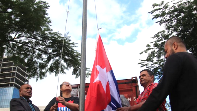 ULMWP president Benny Wenda (left) at a prayer vigil and flag-raising in Suva