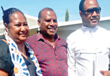 Sidelined PNG Justice Secretary Dr Eric Kwa (centre) pictured with his lawyer Emmanuel Asigau