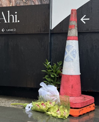 Orchids left at the Auckland construction site in memory of the two dead victims