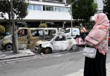 Burnt-out cars in the Northern suburbs of Paris, Sarcelles