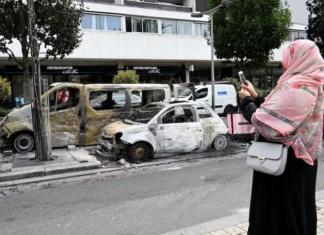 Burnt-out cars in the Northern suburbs of Paris, Sarcelles