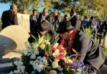 Mourners pay their respects at the wake for PNG businessman Sir Kostas Constantinou