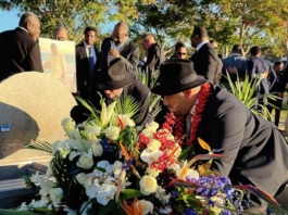 Mourners pay their respects at the wake for PNG businessman Sir Kostas Constantinou