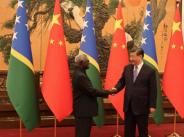Solomon Islands PM Manasseh Sogavare meeting with Chinese President Xi Jinping . . . under fire for lack of transparency over nine deals