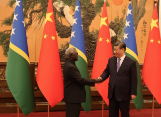 Solomon Islands PM Manasseh Sogavare meeting with Chinese President Xi Jinping . . . under fire for lack of transparency over nine deals