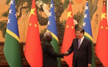 Solomon Islands PM Manasseh Sogavare meeting with Chinese President Xi Jinping . . . under fire for lack of transparency over nine deals