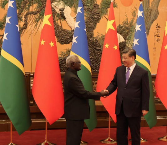 Solomon Islands PM Manasseh Sogavare meeting with Chinese President Xi Jinping . . . under fire for lack of transparency over nine deals