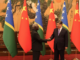 Solomon Islands PM Manasseh Sogavare meeting with Chinese President Xi Jinping . . . under fire for lack of transparency over nine deals