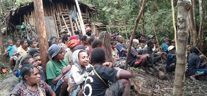West Papuan villagers in their forest home in the Kiwirok district while seeking safety