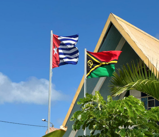 Flying high . . . the Morning Star ensign -- banned in Indonesia -- flying alongside the Vanuatu national flag in Port Vila