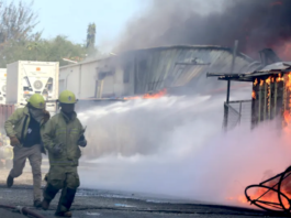 Firefighters battle to put out a Port Moresby fire