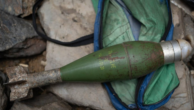 An M72 mortar shell fired by Indonesian forces and recovered by villagers