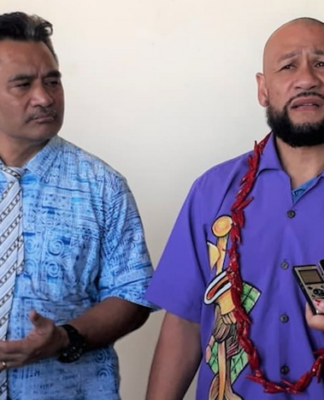 An archival photo of Lema'i Faioso Sione (left) and Malele Paulo