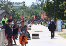 Ni-Vanuatu people going on about their daily lives in Port Vila