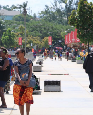 Ni-Vanuatu people going on about their daily lives in Port Vila