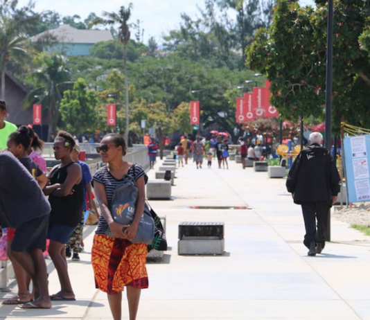 Ni-Vanuatu people going on about their daily lives in Port Vila