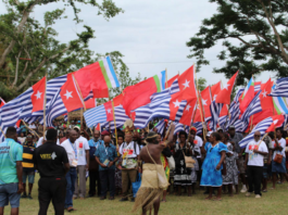 The West Papua delegation flying the Morning Star flag at the opening of the MACFEST 2023