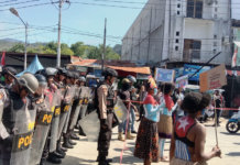 Women protesters daubed in the colours of the Morning Star flag of West Papuan independence