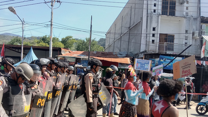 Women protesters daubed in the colours of the Morning Star flag of West Papuan independence