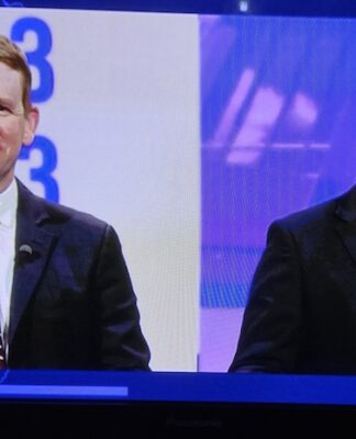 Labour leader Chris Hipkins and National's Christopher Luxon toe-to-toe in last night's first NZ election leaders debate