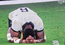 Prayers of elation . . . a jubilant Fiji after beating Australia 22-15