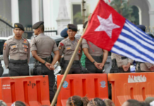 Indonesian security forces confront a West Papuan demonstration