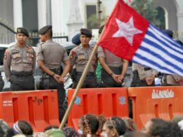 Indonesian security forces confront a West Papuan demonstration