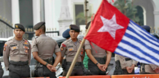 Indonesian security forces confront a West Papuan demonstration