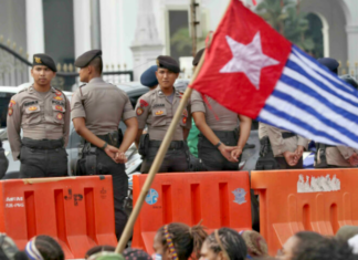 Indonesian security forces confront a West Papuan demonstration
