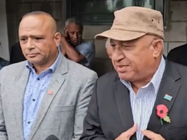 Suspended Fiji police chief Sitiveni Qiliho (left) and ex-prime minister Voreqe Bainimarama