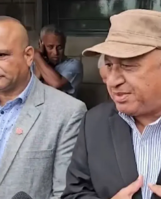 Suspended Fiji police chief Sitiveni Qiliho (left) and ex-prime minister Voreqe Bainimarama