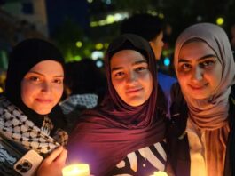 Palestinians and community supporters mourn the deaths in the Gaza hospital bombing