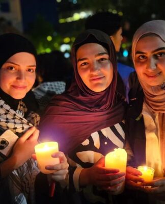 Palestinians and community supporters mourn the deaths in the Gaza hospital bombing