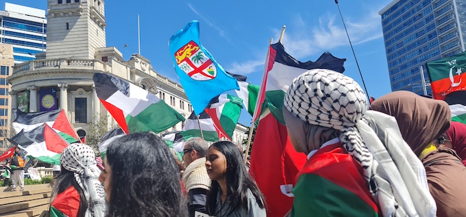 The Fiji flag flies high among the pro-Palestinian demonstrators
