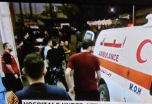 A Gaza ambulance . . . a besieged city and its hospitals overwhelmed by the continuous Israeli bombing