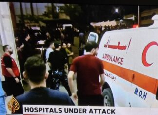 A Gaza ambulance . . . a besieged city and its hospitals overwhelmed by the continuous Israeli bombing